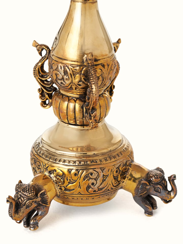 Detail view of Polished Brass Kalash Vilakku highlighting the handcrafted detailing and finish, from a different angle