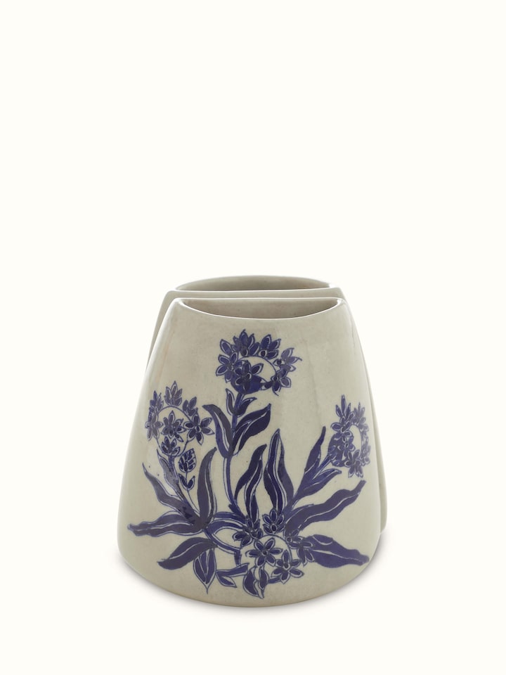 Close-up of Blue Pottery Ceramic Floral Table Vases displaying intricate patterns