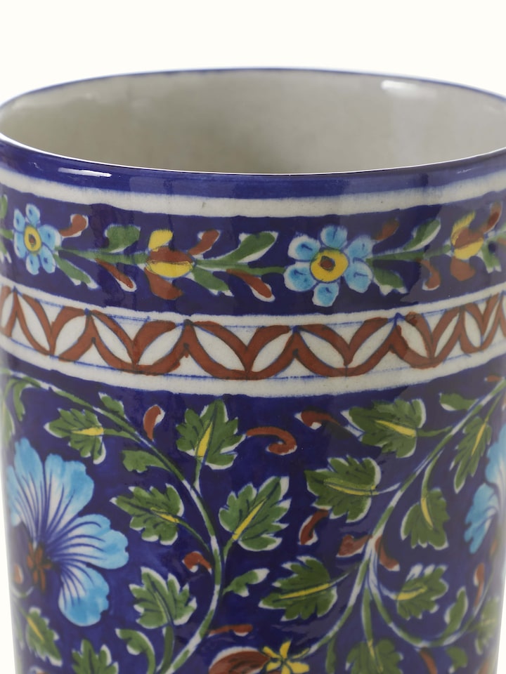 Close-up view of large blue pottery ceramic table vase highlighting the elegant finish and texture of the ceramic