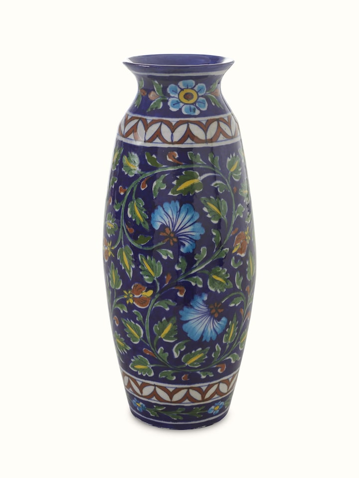Front view of Glossy blue pottery ceramic table vase showcasing vibrant blue glaze and elegant form