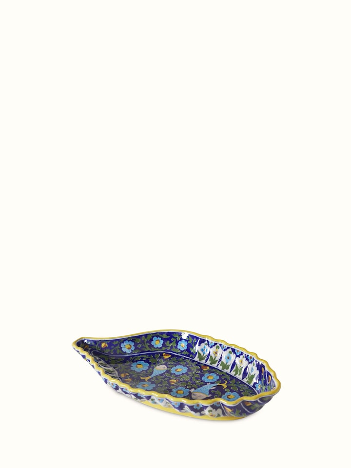 Detailed view showing the ceramic texture and painted details