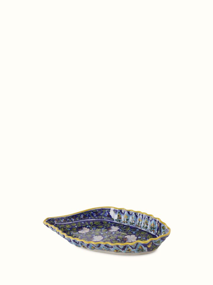 Full view of blue pottery ceramic conch shell planter, showcasing its decorative elements and artisanal quality.