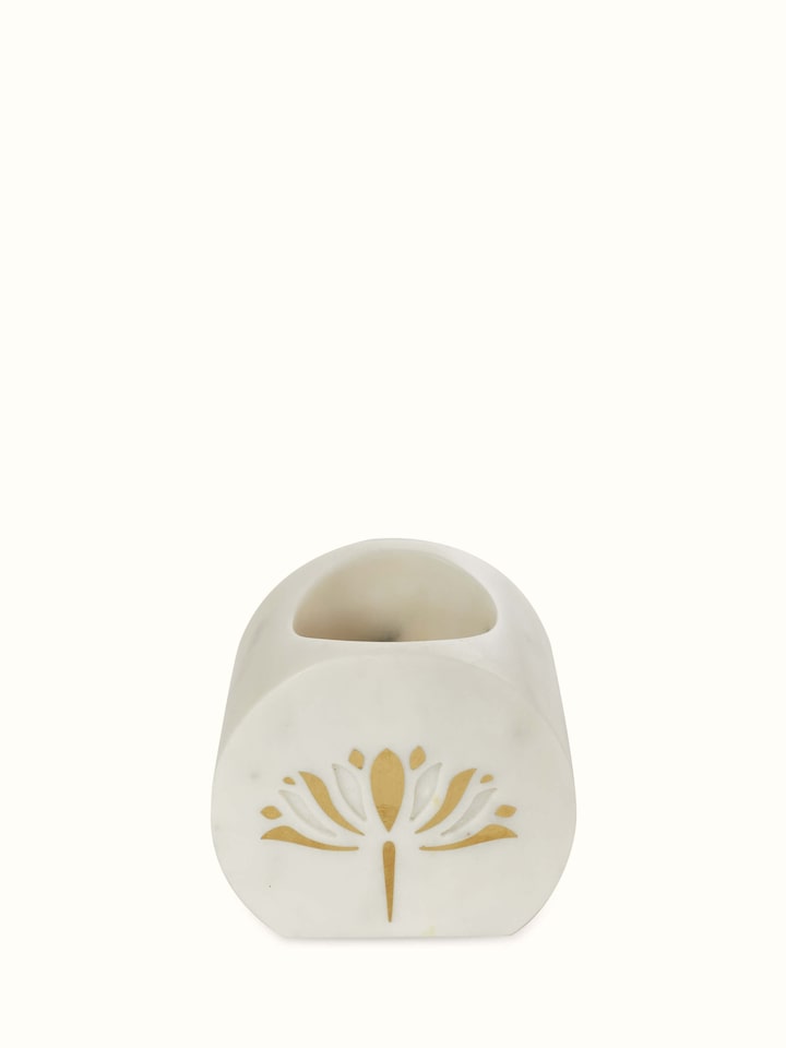Close-up view of Stone-Worked Marble & Brass Toothbrush Holder emphasizing its texture and detail