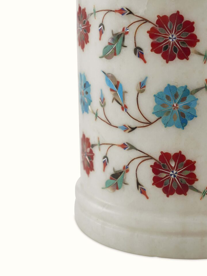 Detailed view of Pacchikari white marble table vase, focusing on the fine marble finish and ornate carvings.