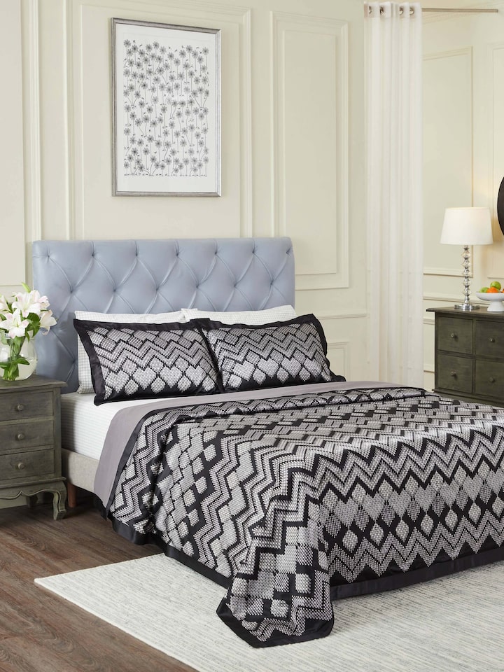 Close-up of Rambagh geometric viscose cotton blend Sanganeri block printed double bedspread set, highlighting the detailed design.
