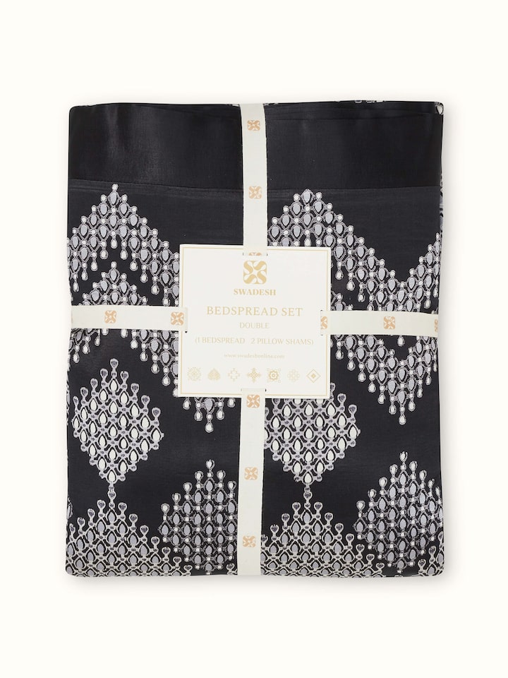 Rambagh geometric viscose cotton blend Sanganeri block printed double bedspread set, side view of bed arrangement.