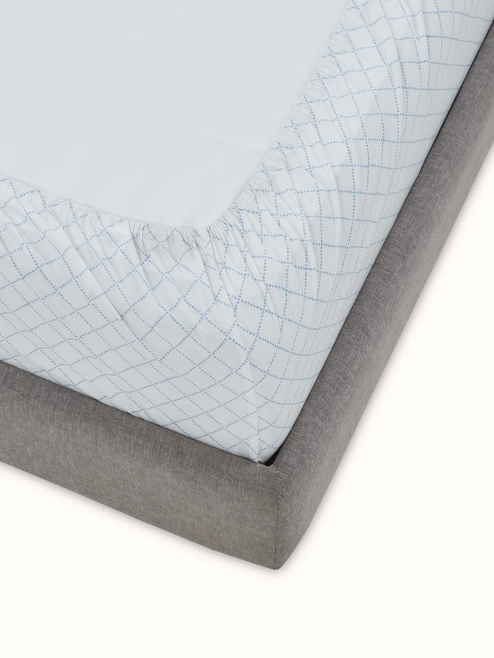 Detailed view of Pratidin Light Blue Diamond Cotton Sanganeri Block Printed King Fitted Bedsheet Set, emphasizing the fabric and design.