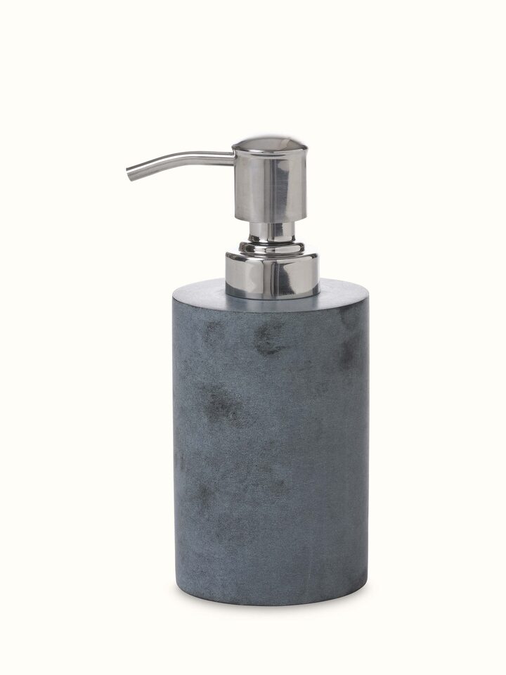 Front view of glossy carved stone soap dispenser showcasing its elegant design and polished stone finish.