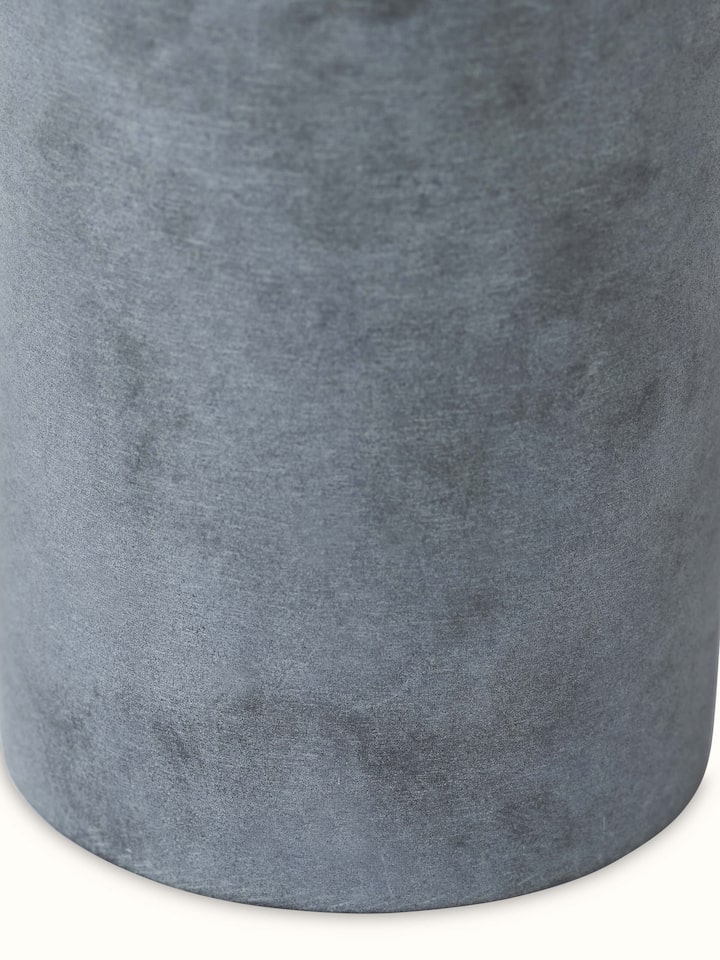 Full view of glossy carved stone soap dispenser displaying its overall design and luxurious polished appearance.