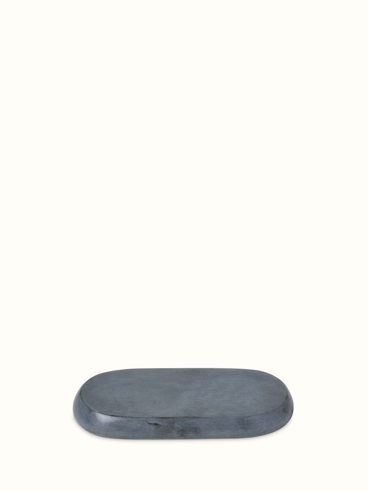 Full view of natural carved stone bath tray, featuring its smooth finish and elegant carved details.