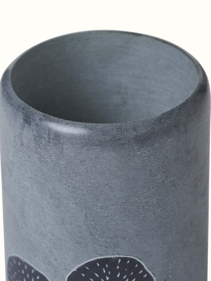 Detailed view of Carved stone toothbrush holder highlighting craftsmanship