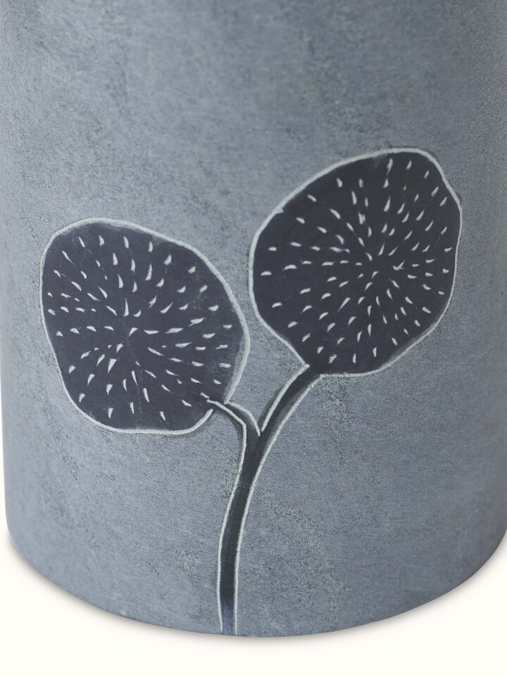 Angled view of Carved stone toothbrush holder showcasing its intricate design