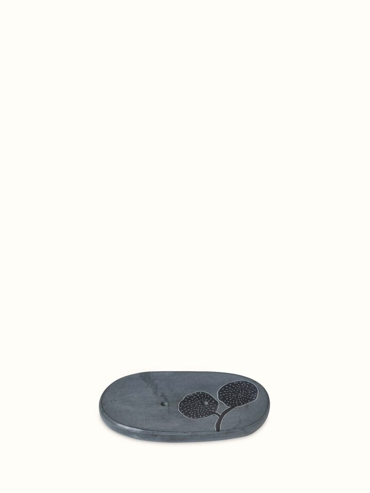 Front view of natural carved stone soap dish, showcasing intricate stone carving details.