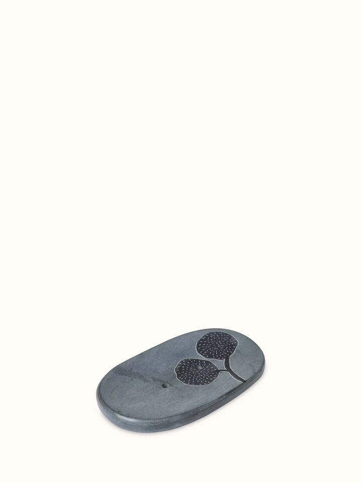 Top view of natural carved stone soap dish, emphasizing its elegant design and craftsmanship.