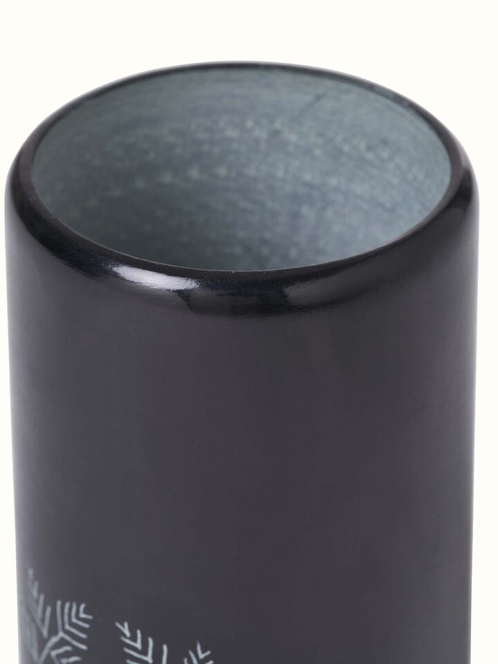 Artistic view of glossy carved stone toothbrush holder showing its elegant design and glossy finish
