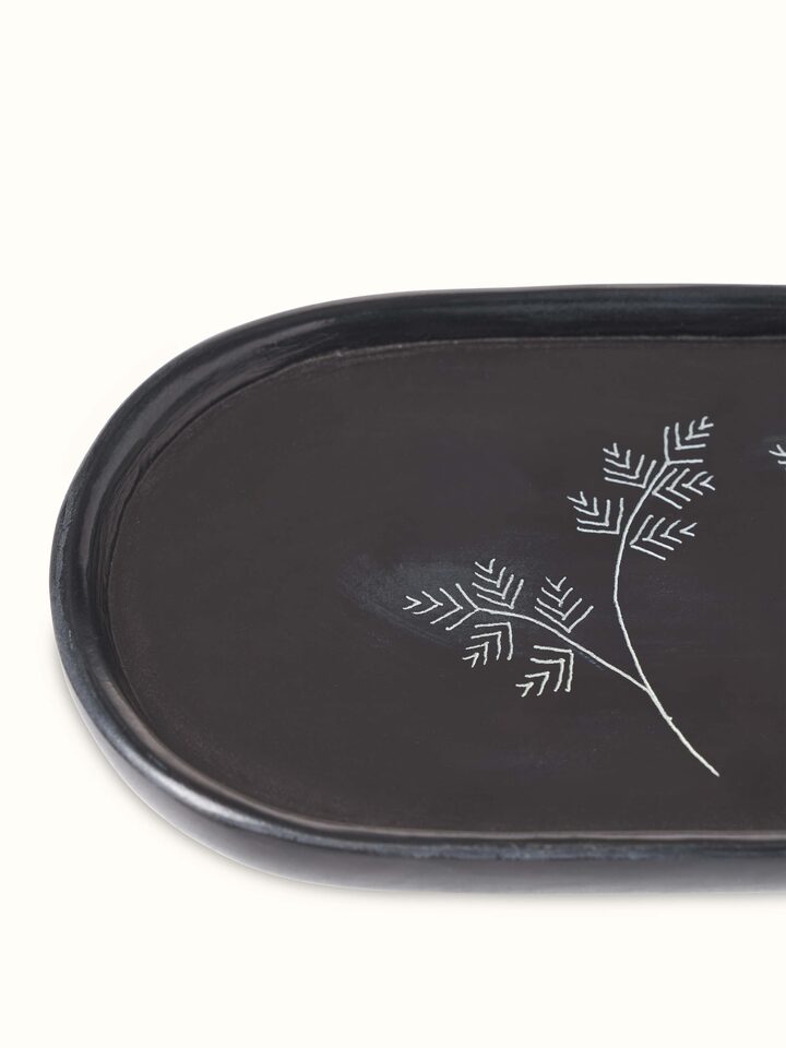 Front view of Carved stone bath tray showcasing the artistic carvings and smooth stone finish