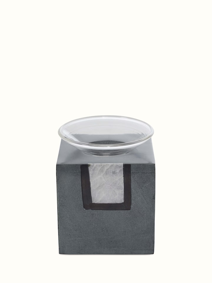 Front view of Carved stone diffuser in grey color showcasing its elegant carving and contemporary design