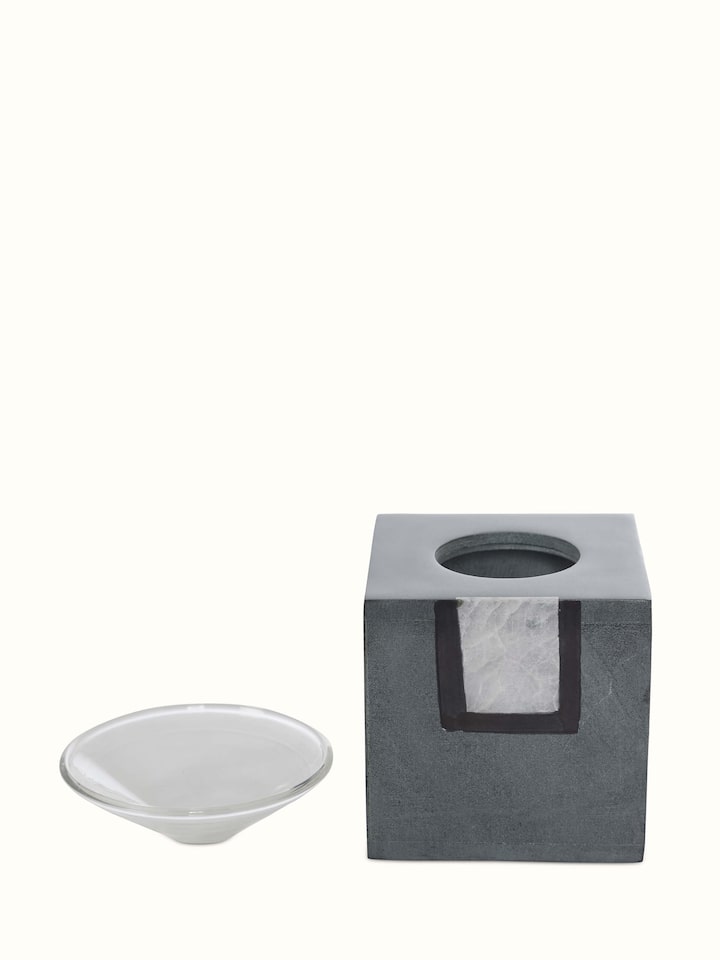 Detailed view of Carved stone diffuser in grey color emphasizing the intricate carving and smooth surface