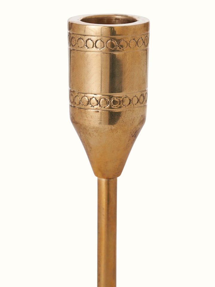 Detailed view of Polished brass candle holder