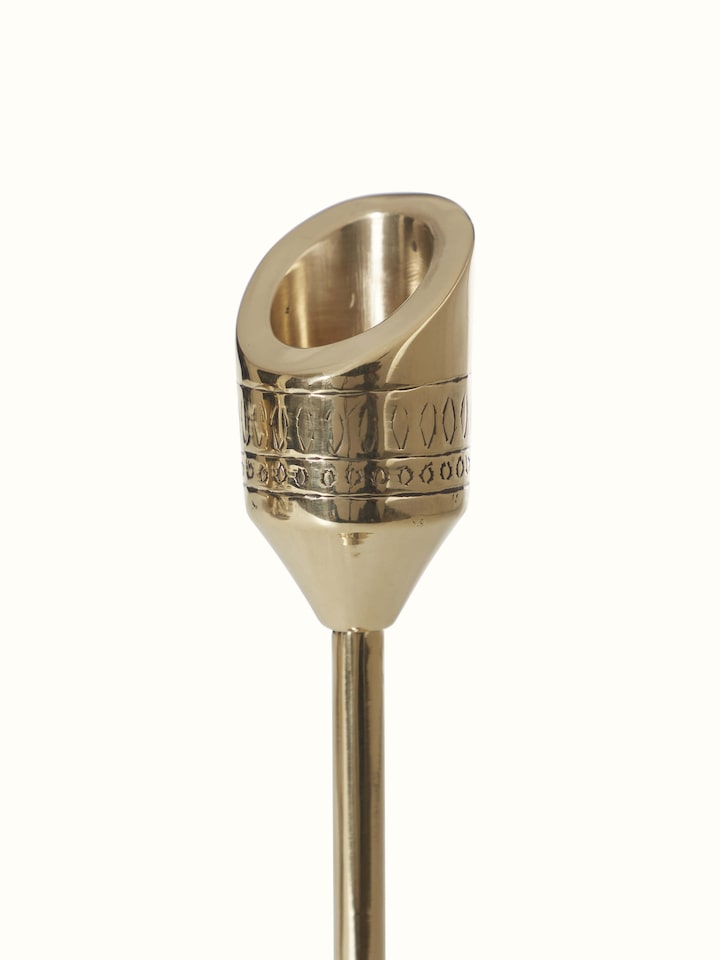 Natural brass candle stand from a different angle, highlighting its design features.