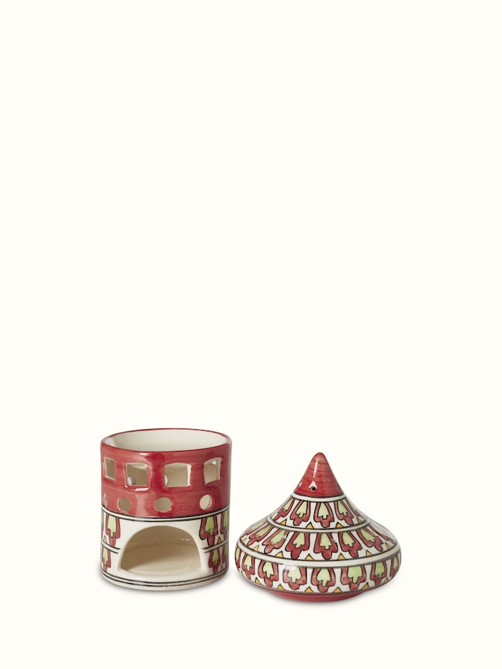 Side view of natural Khurja pottery ceramic aroma oil burner highlighting the handcrafted details and ceramic finish
