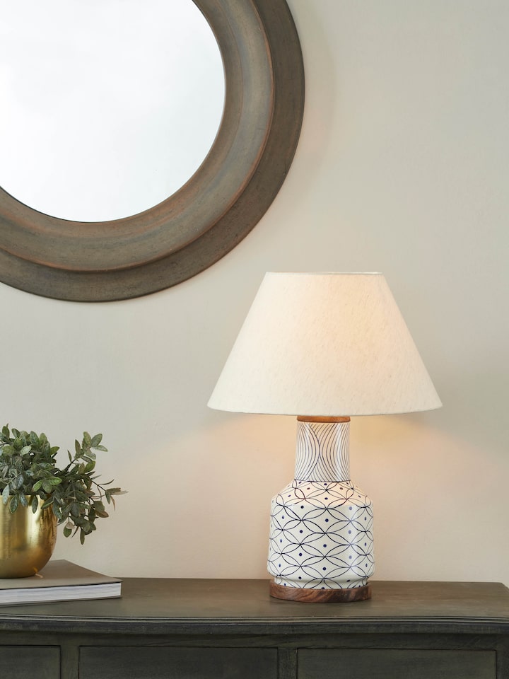 Side view of medium Khurja pottery ceramic table lamp displaying unique pattern