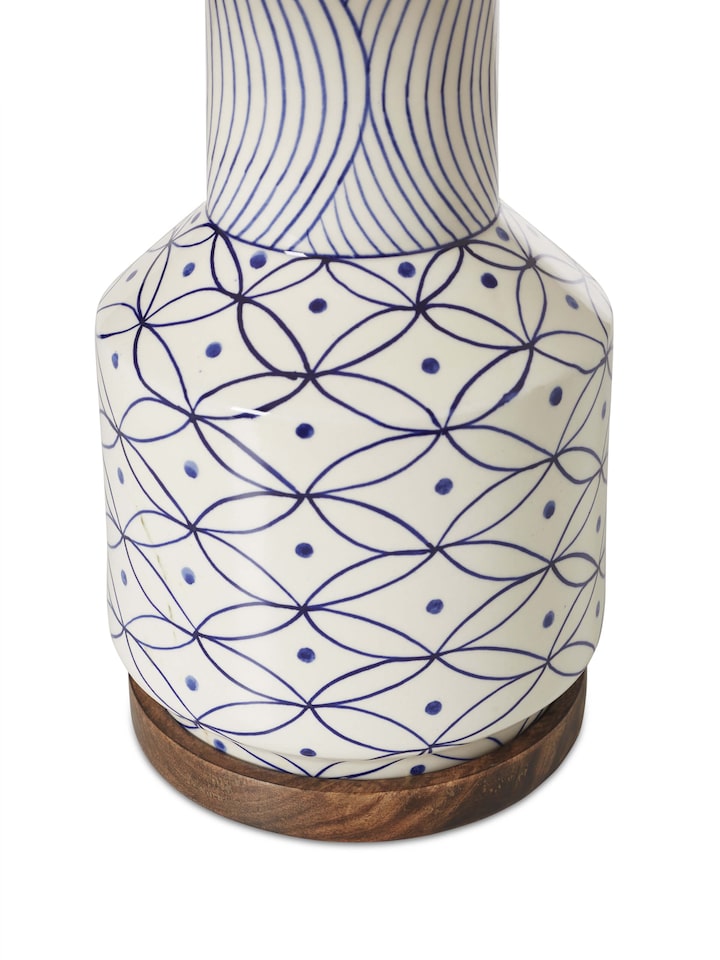 Angle view of medium Khurja pottery ceramic table lamp highlighting craftsmanship
