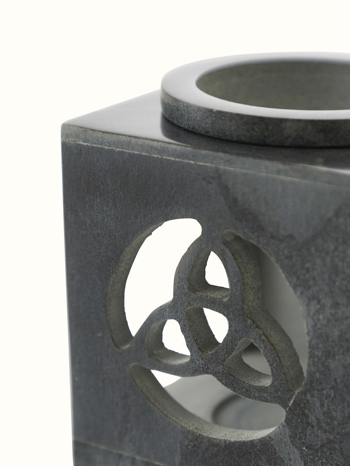 Back view of carved soapstone aroma oil burner & diffuser in black color highlighting the overall craftsmanship and design