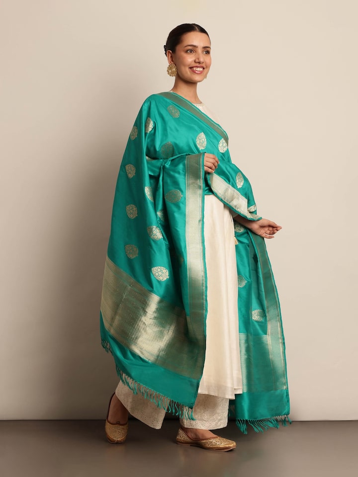 Side view of light green silk Banarasi dupatta with elegant drape
