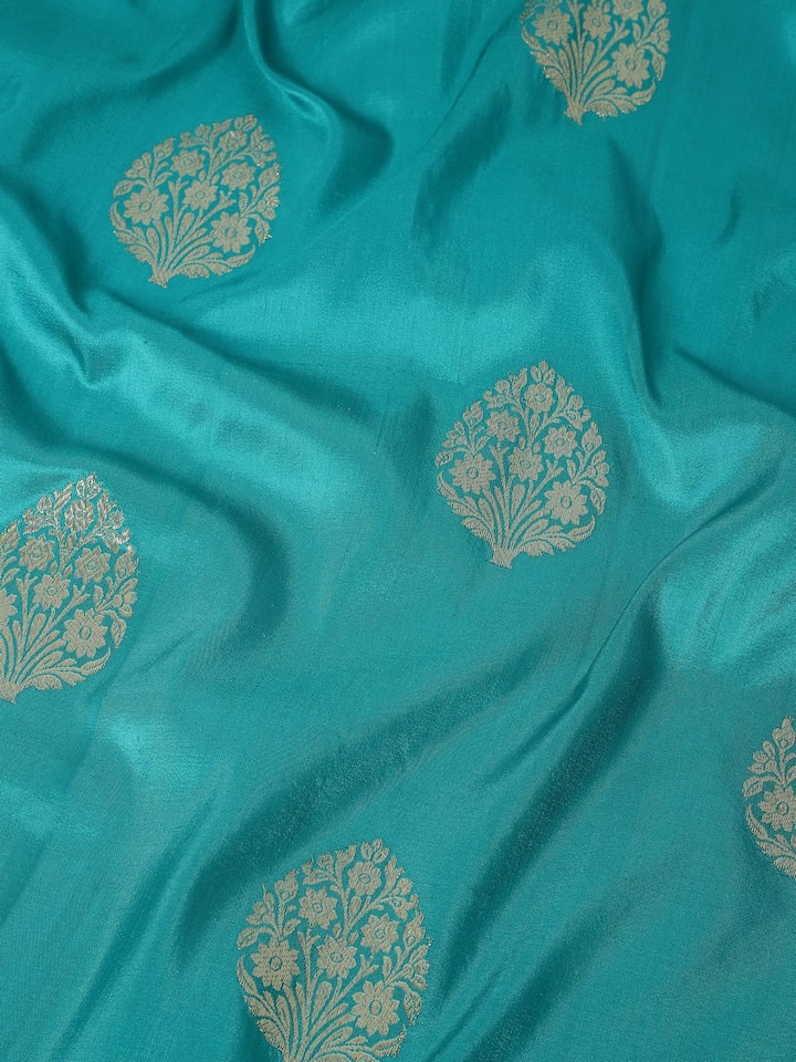 Detail view of light green silk Banarasi dupatta with fabric texture and zari weave