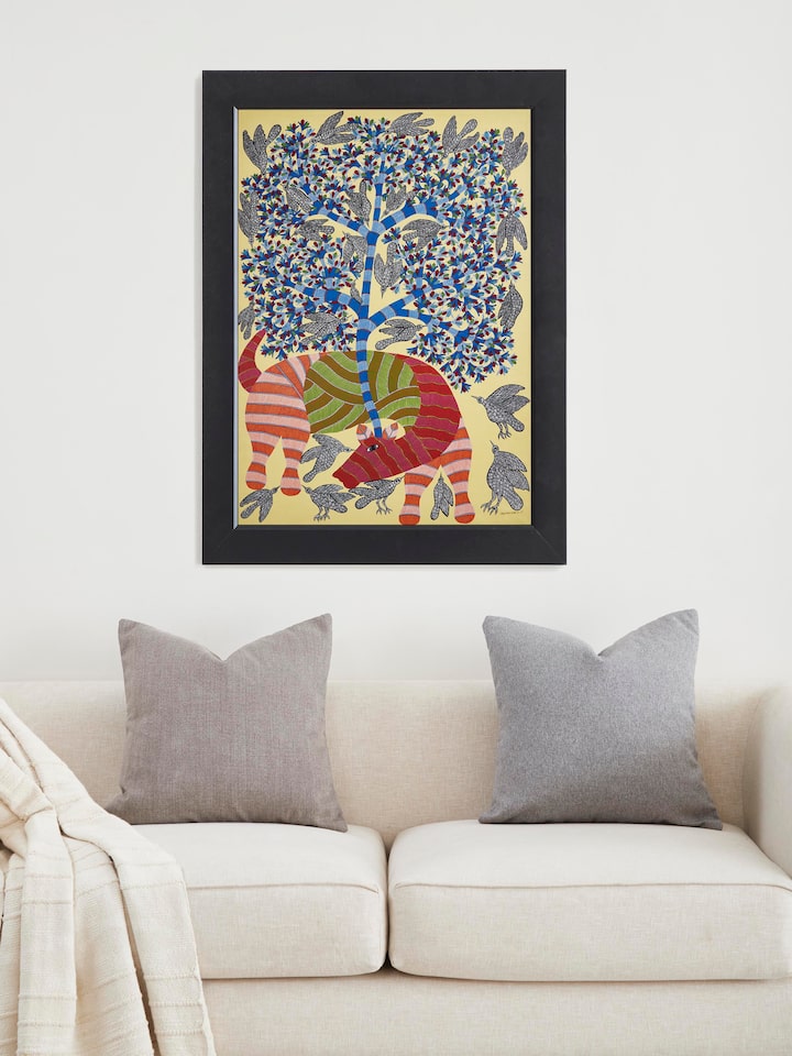 Side view of Gond Cow & Birds with Tree Painting by Swadesh highlighting the composition of cow, birds, and tree elements in the artwork.