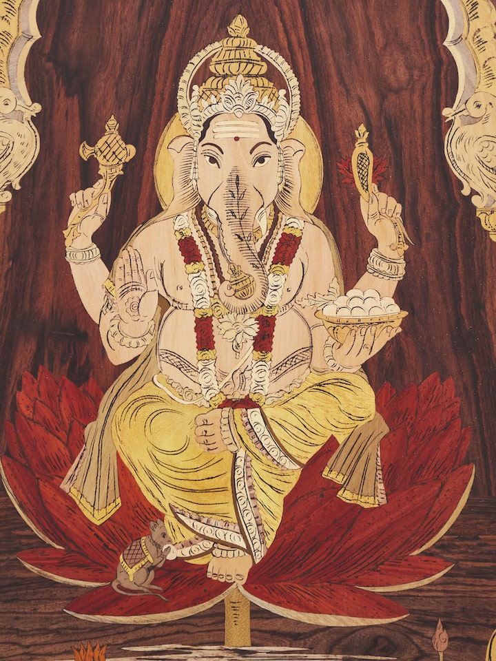 Angled view of Mysore Rosewood Inlaid Ganesha Wall Art revealing its overall artistic and traditional features.