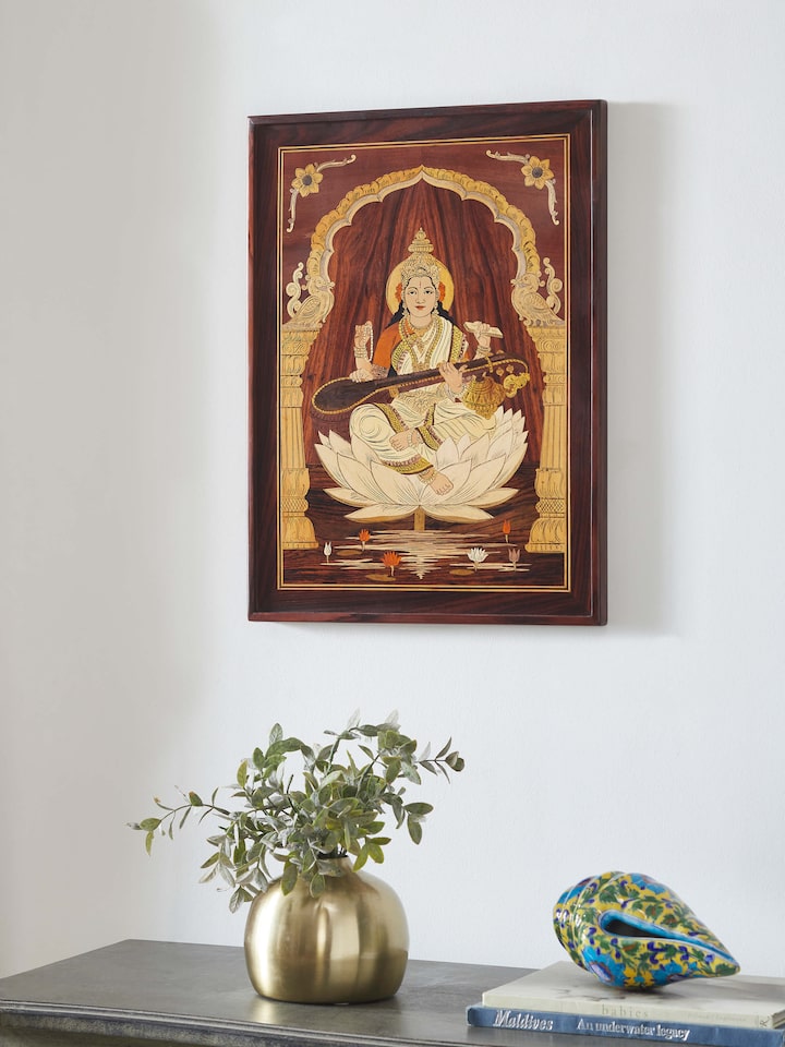 Side view of Mysore rosewood inlaid Saraswathi wall art emphasizing the intricate rosewood inlay and craftsmanship