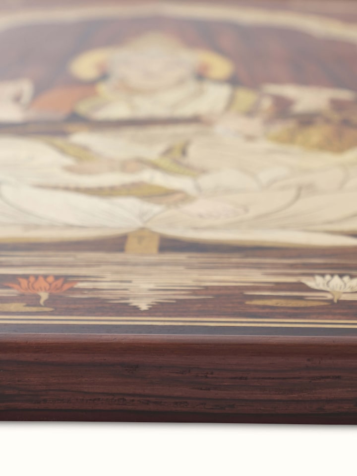 Angled view of Mysore rosewood inlaid Saraswathi wall art highlighting the fine details and elegant design