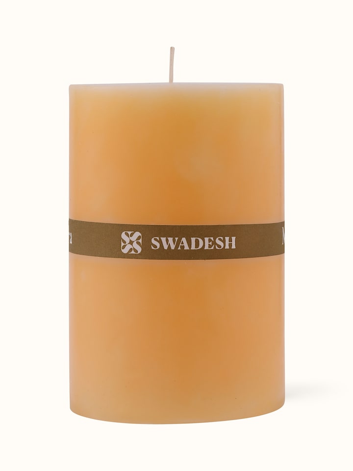 Front view of Mogra pillar candle (4.5 inches) with detailed floral design.