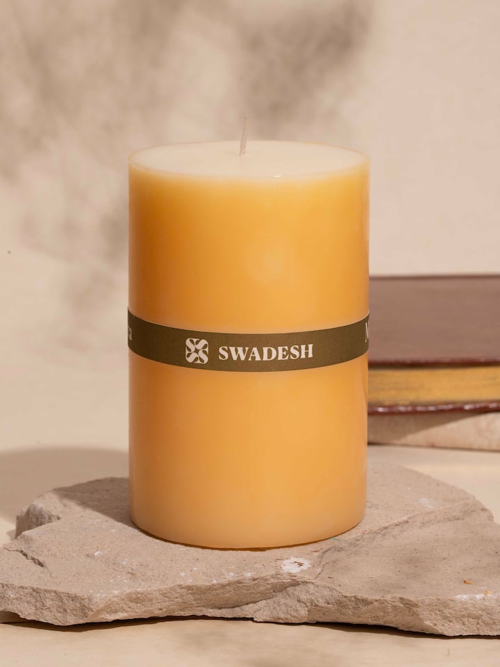 Close-up of Mogra pillar candle (4.5 inches) highlighting its intricate floral texture.