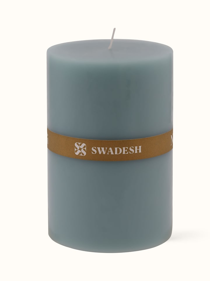 Back view of Neroli Pillar Candle showcasing product information and decorative aspects