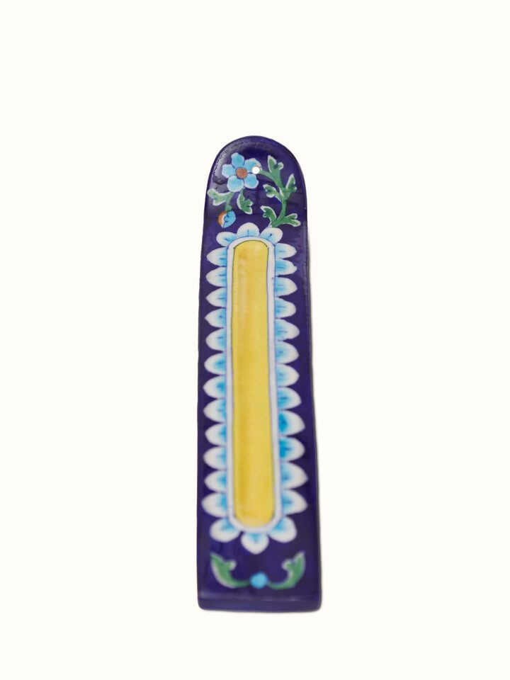 Front view of Polished Blue Pottery Stoneware incense holder featuring intricate blue patterns and smooth finish