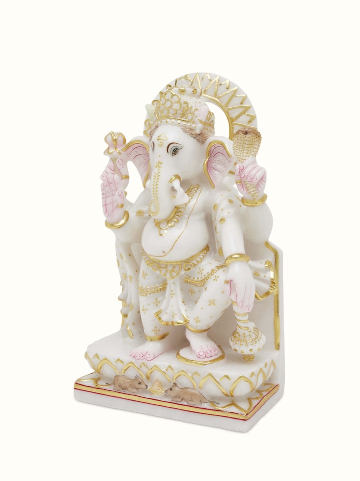 Angled view of Ganesha Carved Marble Idol highlighting the detailed marble carving and artistic design