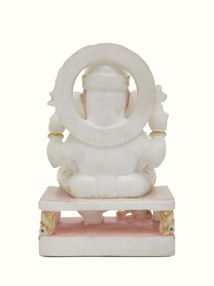 Close-up detail of Carved Marble Ganesha Idol highlighting the fine carving and intricate features.