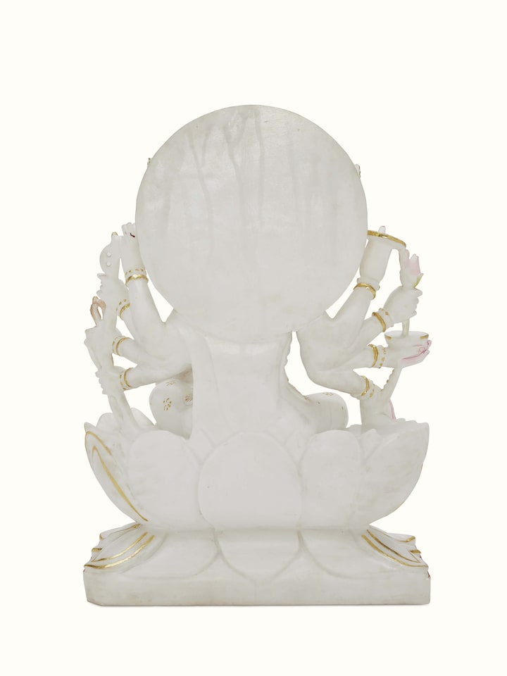 Angled view of Gayatri Mata Ji carved marble idol, emphasizing the detailed craftsmanship and marble finish.