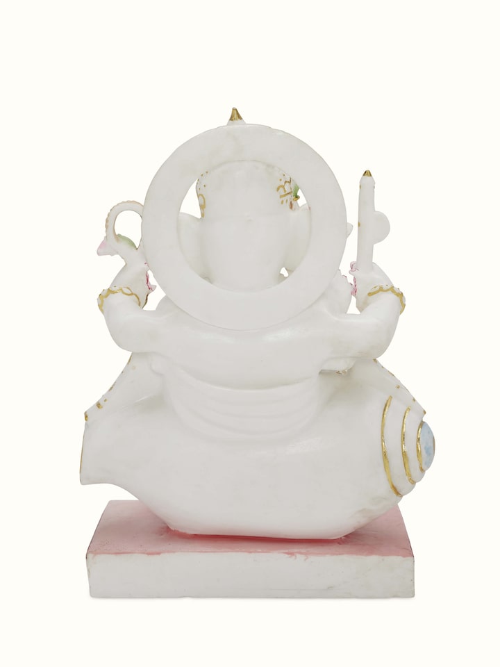 Back view of carved marble Ganesha idol.