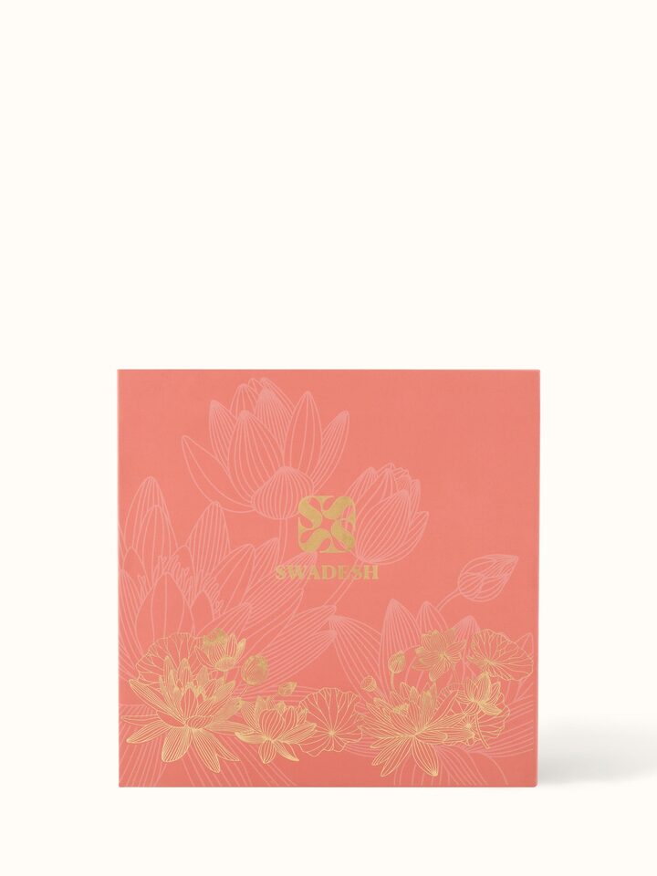 Overhead view of Mogra Copper Candle focusing on its design and decorative elements