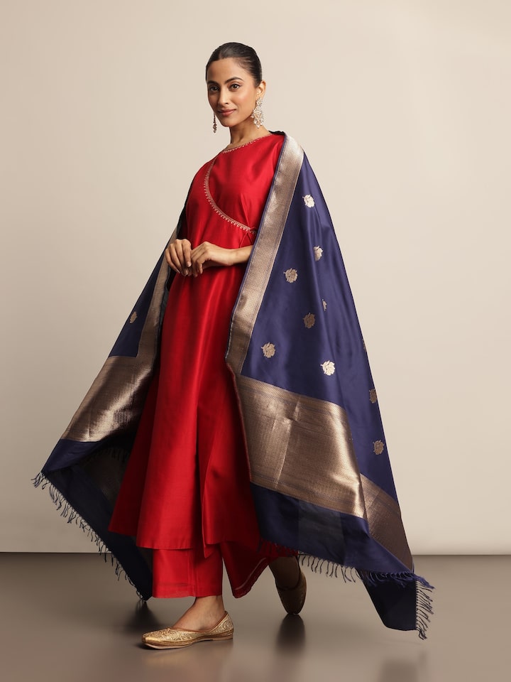 Lifestyle view of blue Banarasi silk dupatta styled over festive kurta for elegant look
