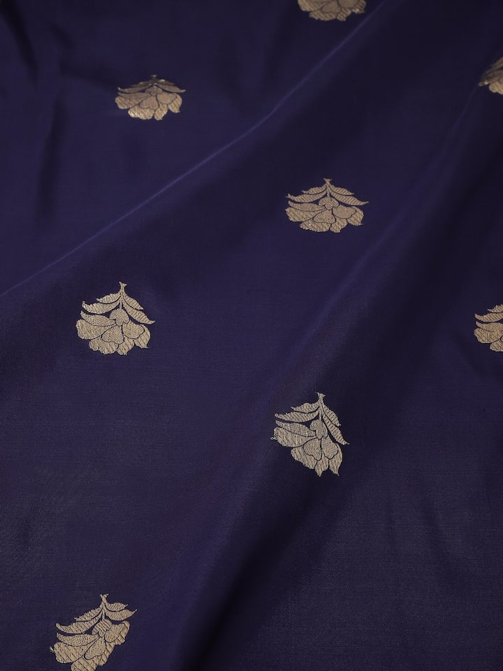 Detail view showing zari floral motifs and fine silk texture of blue Banarasi dupatta