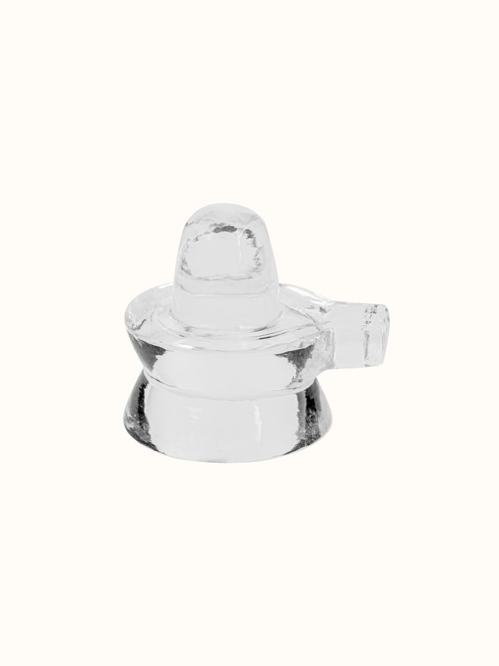 Front view of Medium Crystal Shivling highlighting its smooth surface and intricate craftsmanship