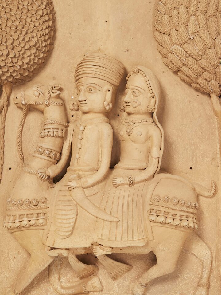 Close-up view of Terracotta clay Dhola Maru sculpture showcasing intricate details