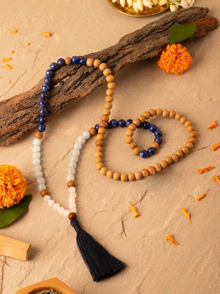 Close-up of Lapis Lazuli, Aquamarine & White Moonstone Mala focusing on the texture and color contrast of the beads.