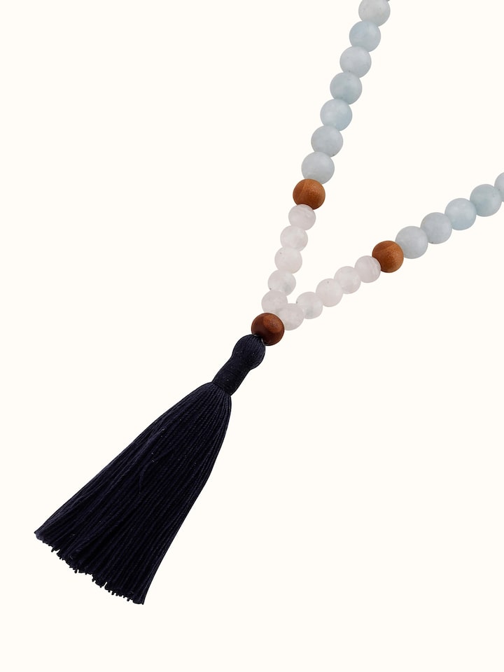 Top view of Lapis Lazuli, Aquamarine & White Moonstone Mala showcasing the layout and arrangement of the beads.