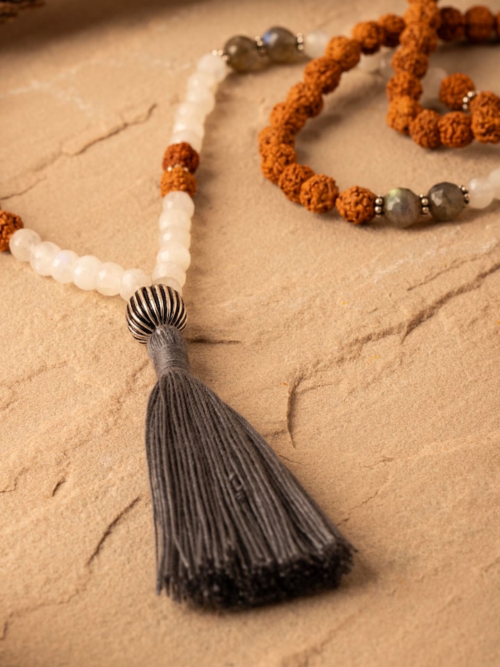 Detailed close-up of Labradorite, White Moonstone & Rudraksha Silver Mala, focusing on the bead textures and finishes.